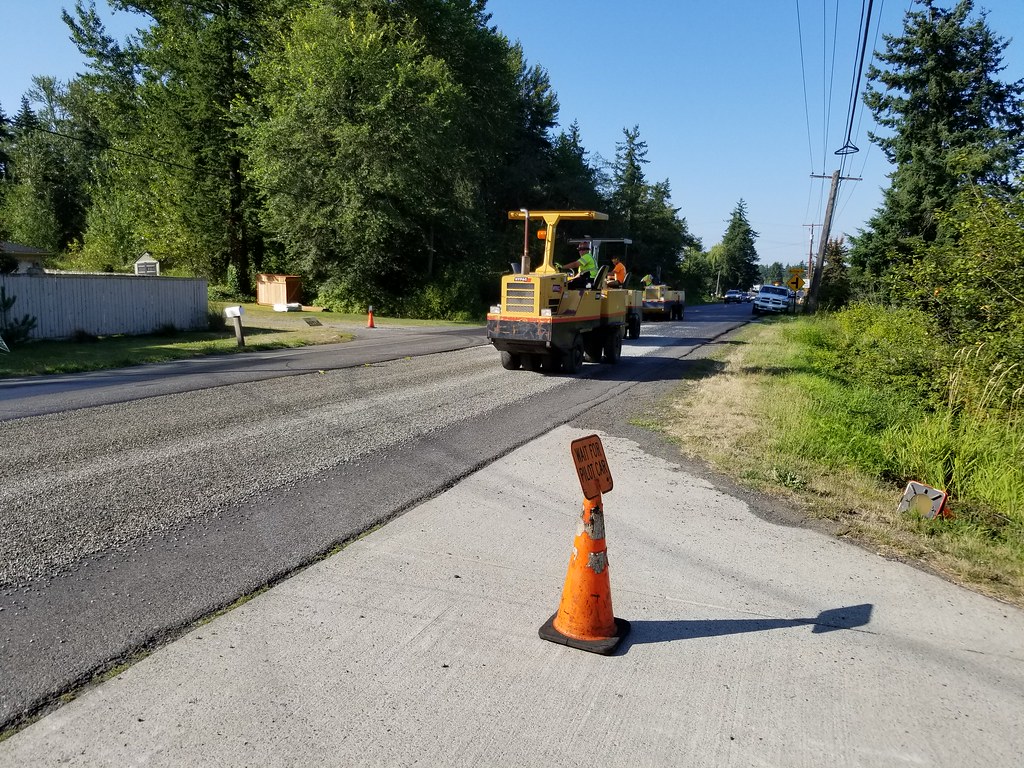 Big job, small sign | Contractor crews working for WSDOT use… | Flickr